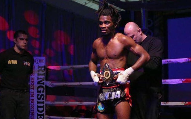andre awarding wmo belt